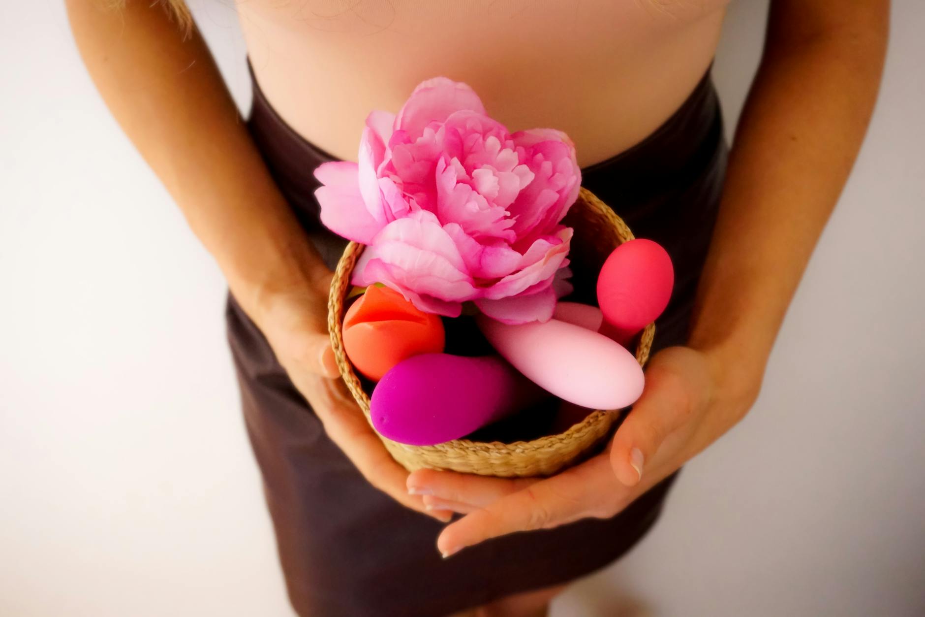 Two fresh lemons held in cupped hands, symbolizing gentle, natural touch